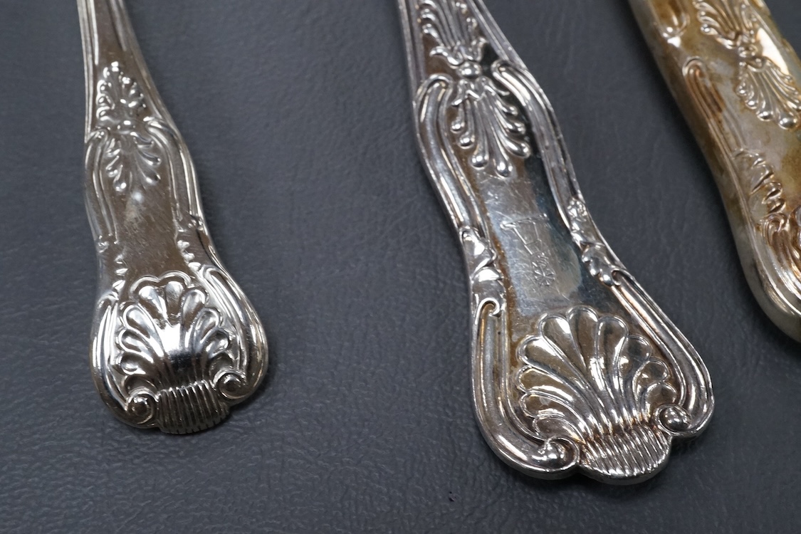 A harlequin part canteen of late 19th/early 20th century silver King's pattern flat ware, comprising eight table spoons, nine dessert spoons, two table forks, one dessert fork and two coffee spoons, by James Dixon & Sons